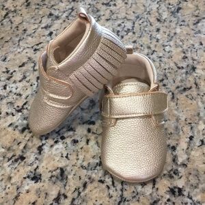 NWOT gold moccasins
